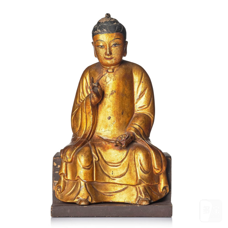 A gilt and polychrome lacquer figure of a divinity,